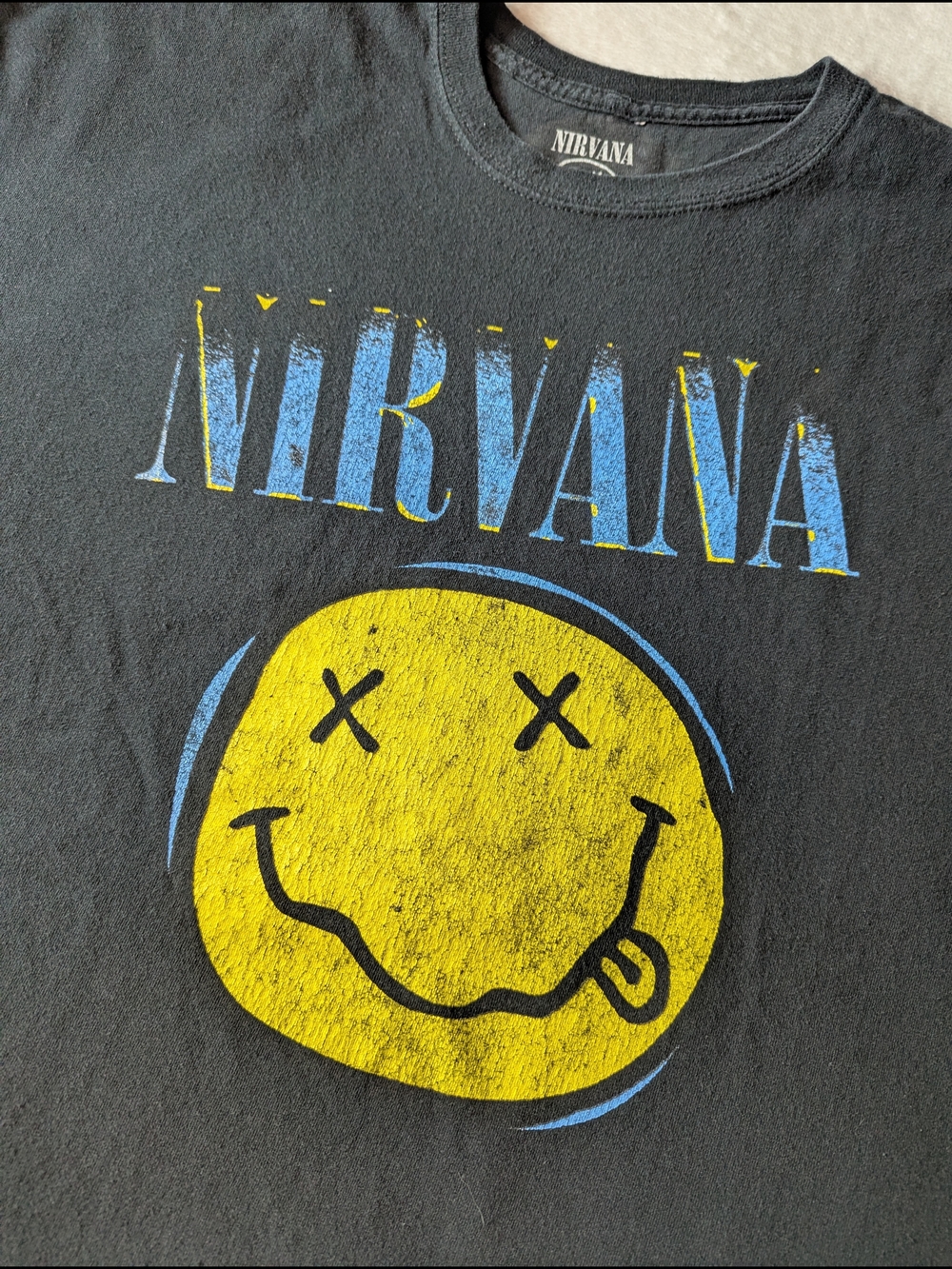 NIRVANA Black Tee with Yellow Smiley and Blue Logo